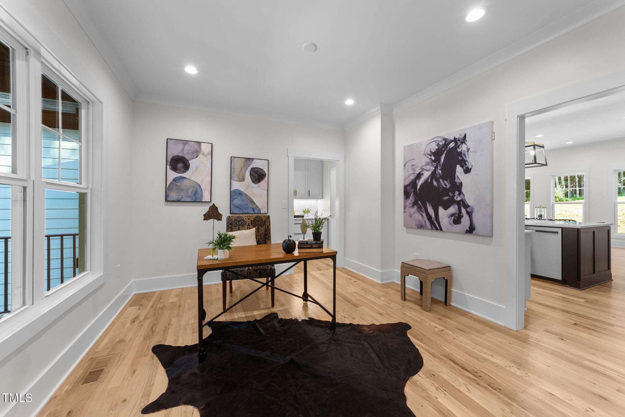 2817 Silk Hope Gum Springs Road Pittsboro, NC 27312 - Photo 8 of 56 a living room with furniture and wooden floor