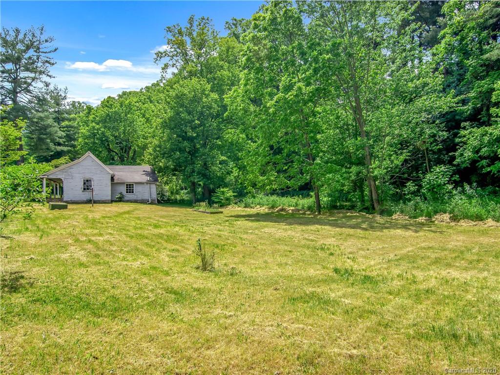 5020 Dutch Cove Road Canton, NC 28716 - Photo 2 of 19 a view of a yard with an outdoor space