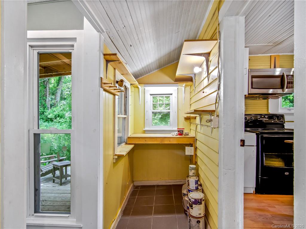5020 Dutch Cove Road Canton, NC 28716 - Photo 14 of 19 a kitchen with a refrigerator and a stove