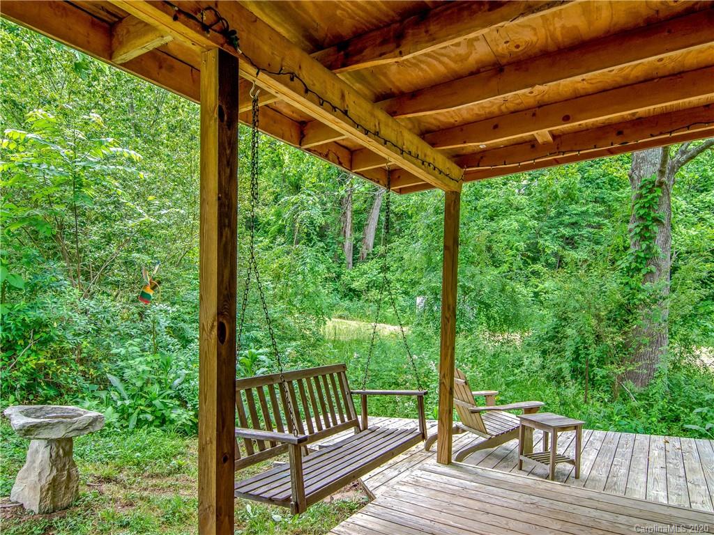 5020 Dutch Cove Road Canton, NC 28716 - Photo 15 of 19 a view of porch with green trees