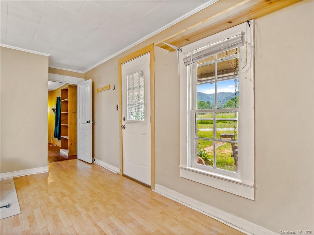 5020 Dutch Cove Road Canton, NC 28716 - Photo 6 of 19 a view of an empty room with window and bathroom