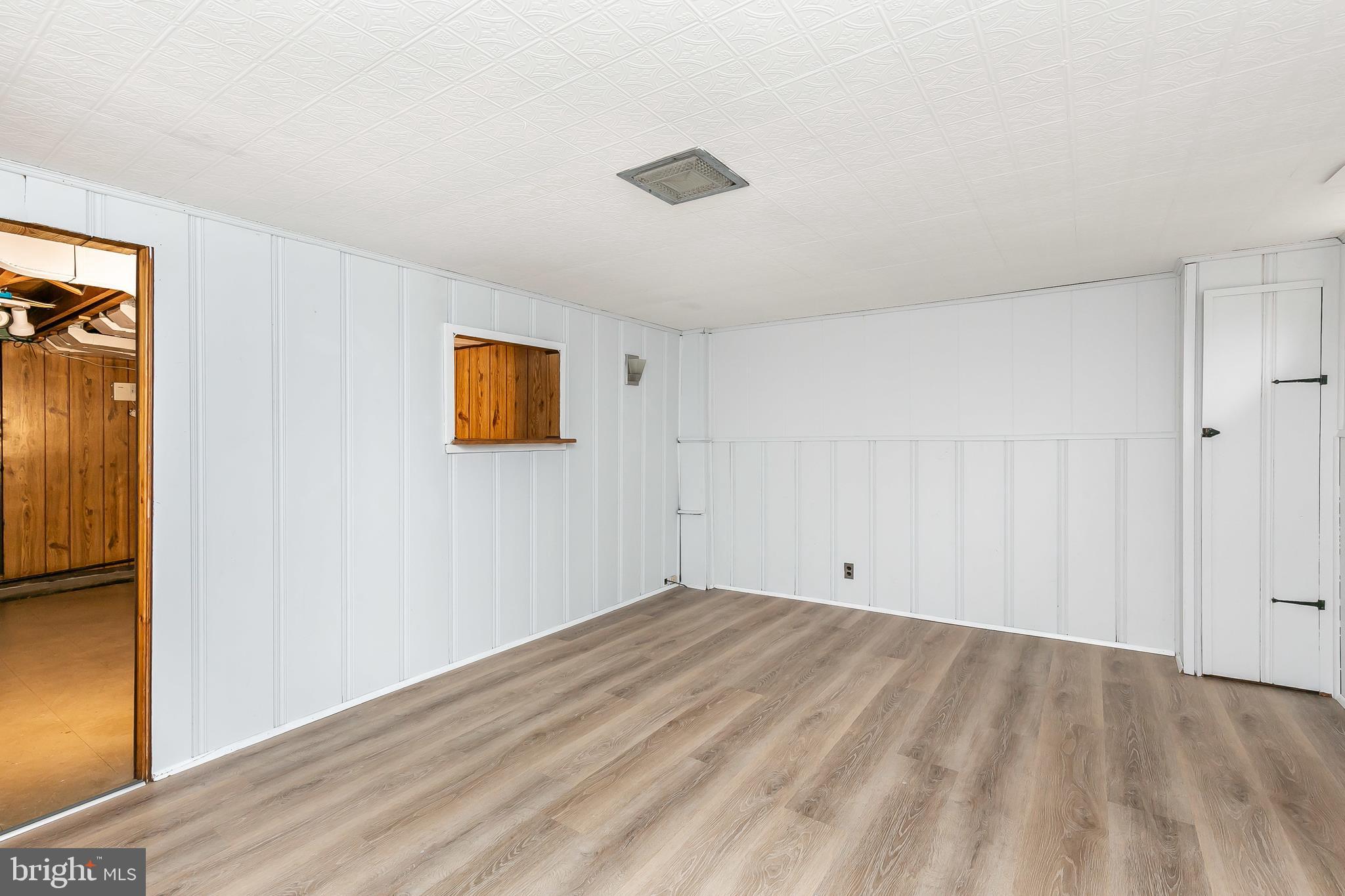 1652 Thetford Road Baltimore, MD 21286 - Photo 30 of 41 Finished Basement w/ New Vinyl Planking Floors