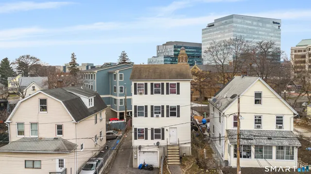 a view of residential houses with city view