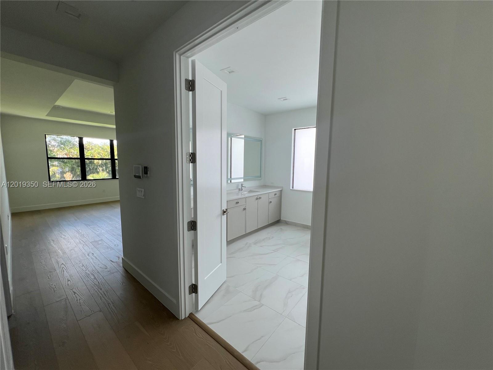 9172 Silver Marsh Lane, Unit 9172 Boca Raton, FL 33434 - Photo 18 of 34 wooden floor in a room