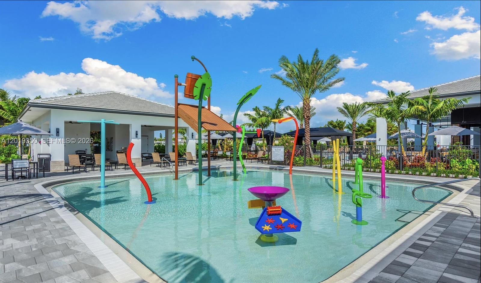 9172 Silver Marsh Lane, Unit 9172 Boca Raton, FL 33434 - Photo 24 of 34 a view of a play house with a swimming pool