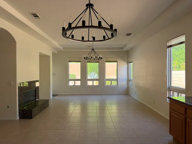 a view of an empty room and window