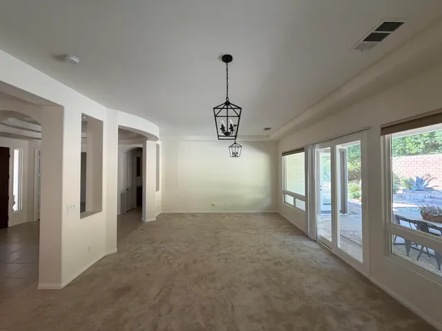 a view of a room with a large windows