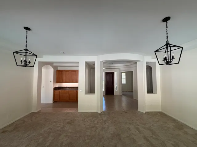 a view interior of a house with a table and chairs
