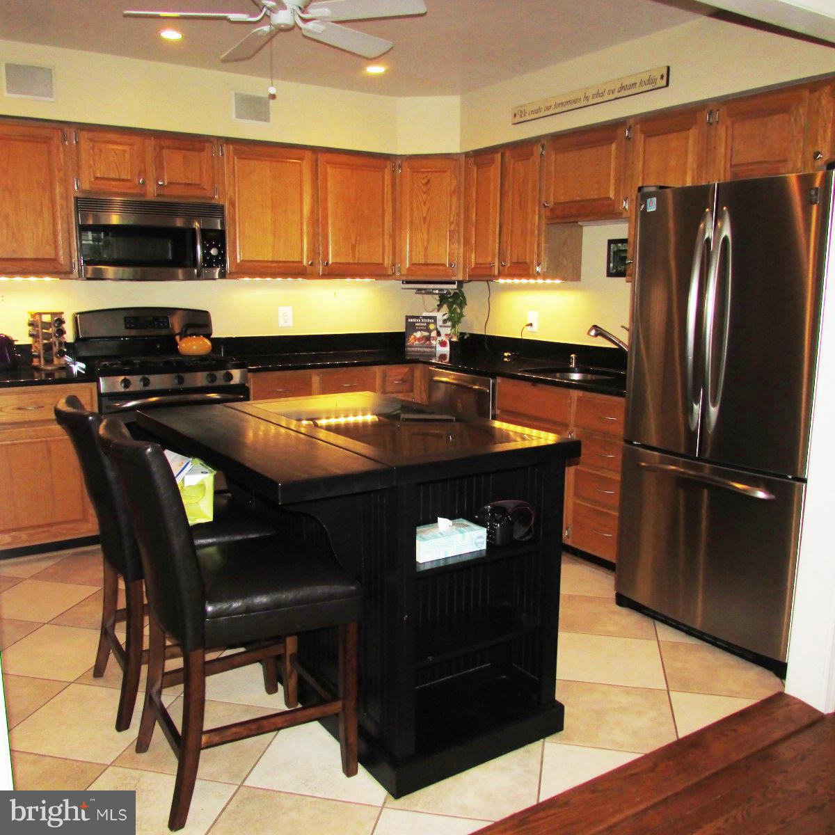 6733 Baron Road McLean, VA 22101 - Photo 6 of 29 Newer appliances, island, ceramic tile, granite