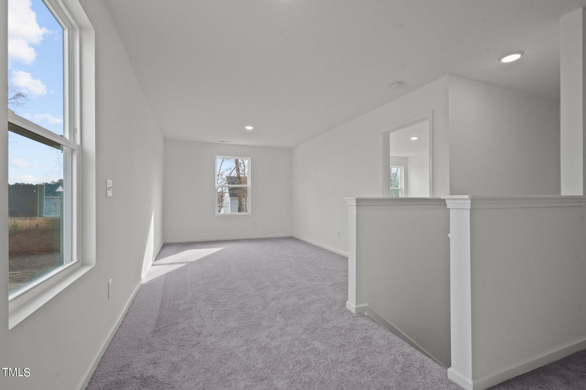 904 Rift Vly Drive Zebulon, NC 27597 - Photo 20 of 43 an empty room with windows