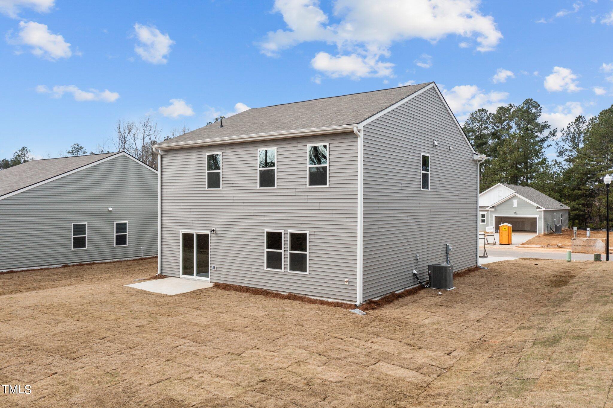904 Rift Vly Drive Zebulon, NC 27597 - Photo 37 of 43 a view of a house with a yard