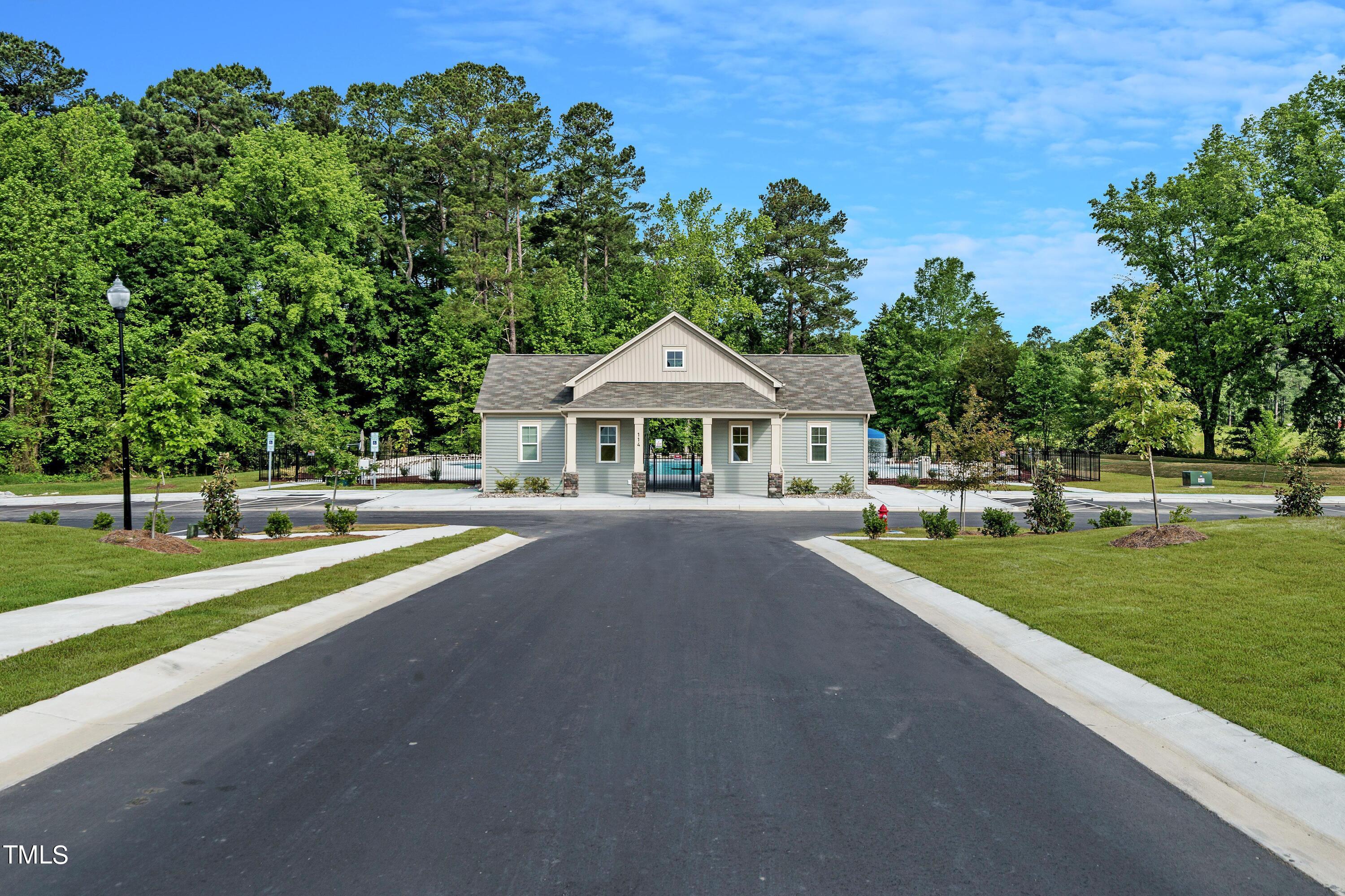 904 Rift Vly Drive Zebulon, NC 27597 - Photo 39 of 43 a front view of a house with garden