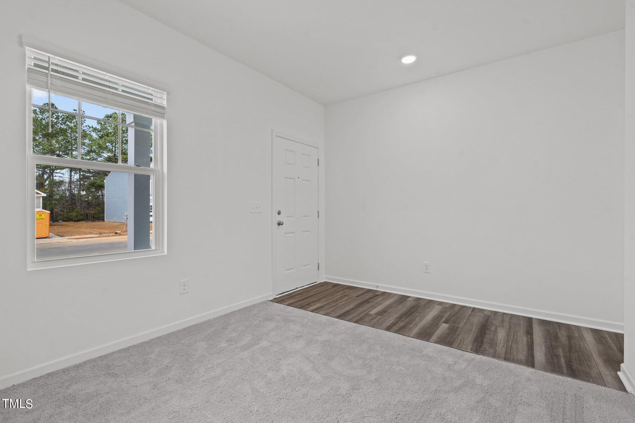 904 Rift Vly Drive Zebulon, NC 27597 - Photo 6 of 43 an empty room with a window