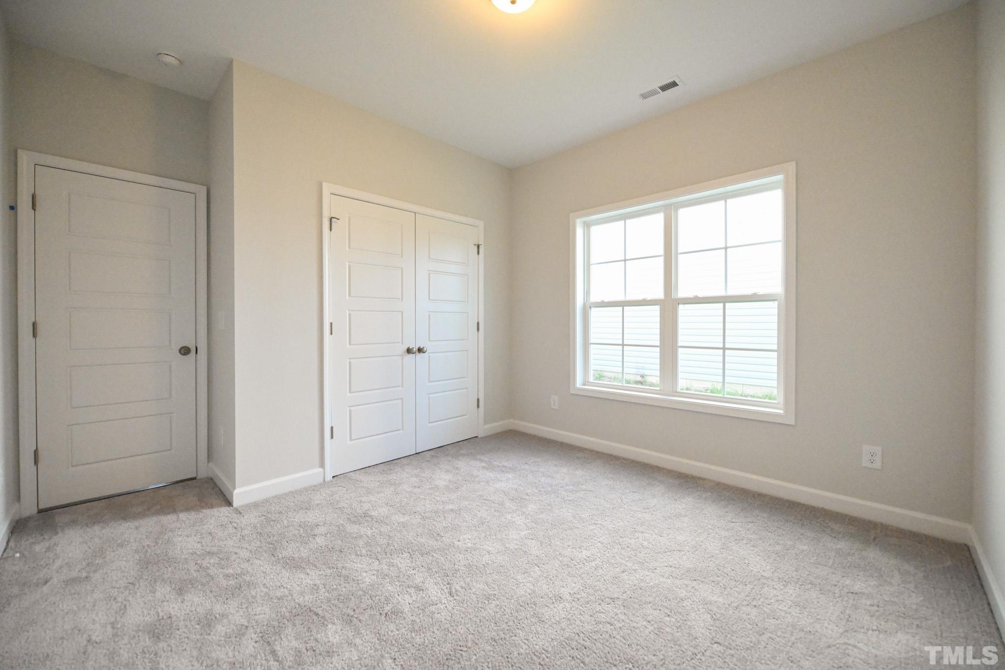 23 Chris Todd Way Angier, NC 27501 - Photo 24 of 28 an empty room with a window