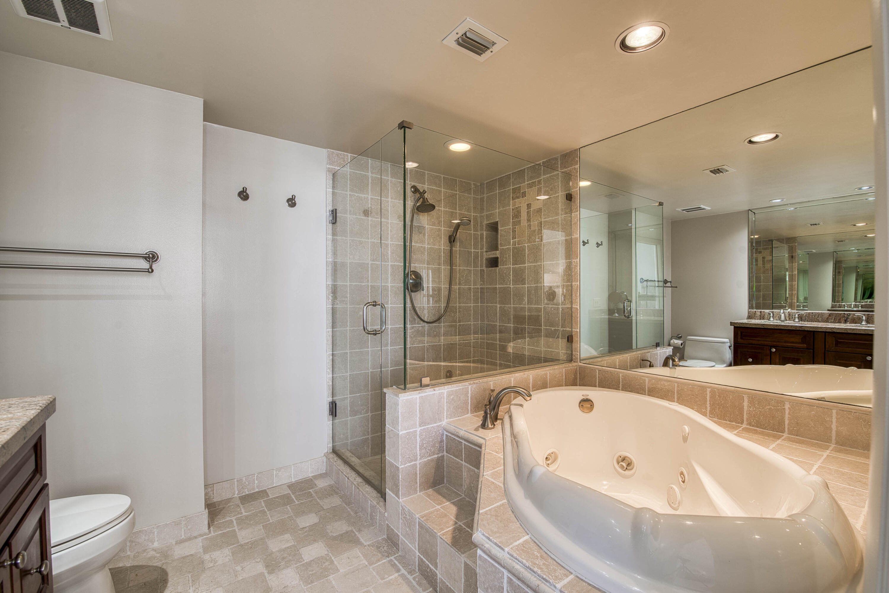 4200 North Ocean Drive, Unit 11405 Singer Island, FL 33404 - Photo 13 of 26 a bathroom with a bathtub and a toilet