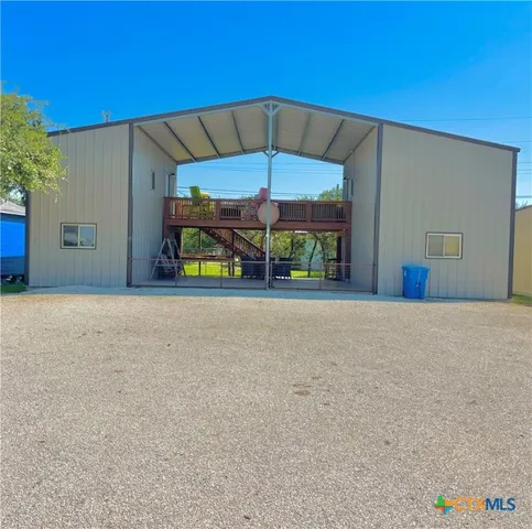 a view of a house with a garage