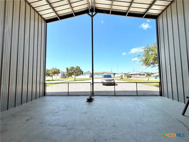 a view of swimming pool with seating area