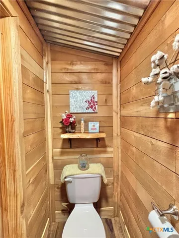 a view of a chairs on the deck