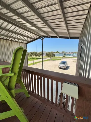 a view of a chairs in patio of the house