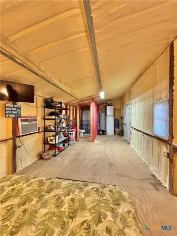 a view of a storage room with furniture