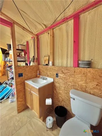 a view of balcony with wooden floor
