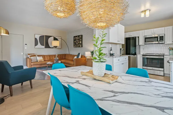 a view of a dining room with furniture