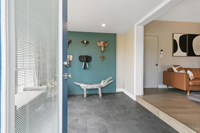 a living room with a couch and a table