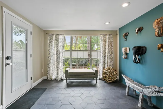 a living room with furniture and a window