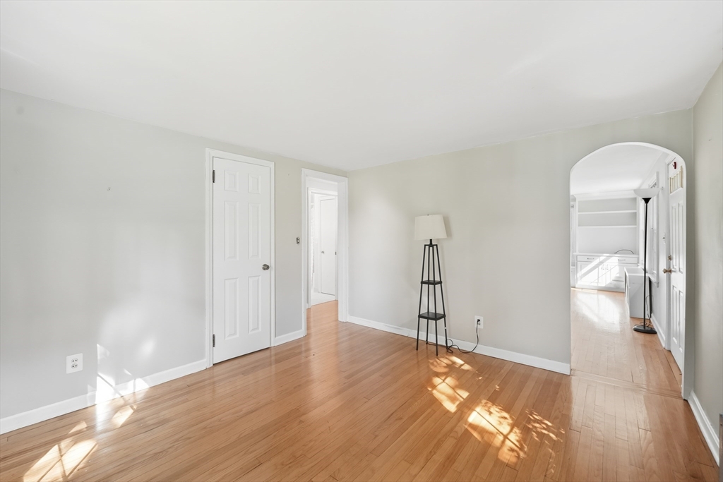 1636 Longmeadow Street Longmeadow, MA 01106 - Photo 19 of 33 a view of empty room with wooden floor