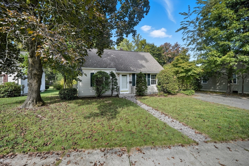 1636 Longmeadow Street Longmeadow, MA 01106 - Photo 2 of 33 a front view of a house with a yard