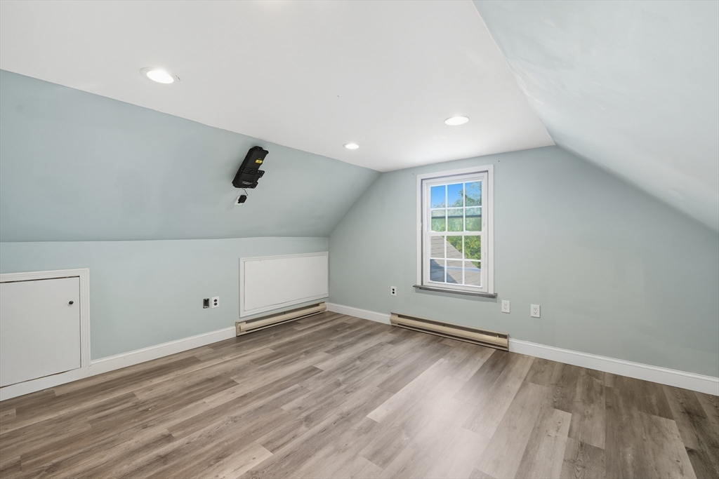 1636 Longmeadow Street Longmeadow, MA 01106 - Photo 26 of 33 wooden floor in an empty room with a window