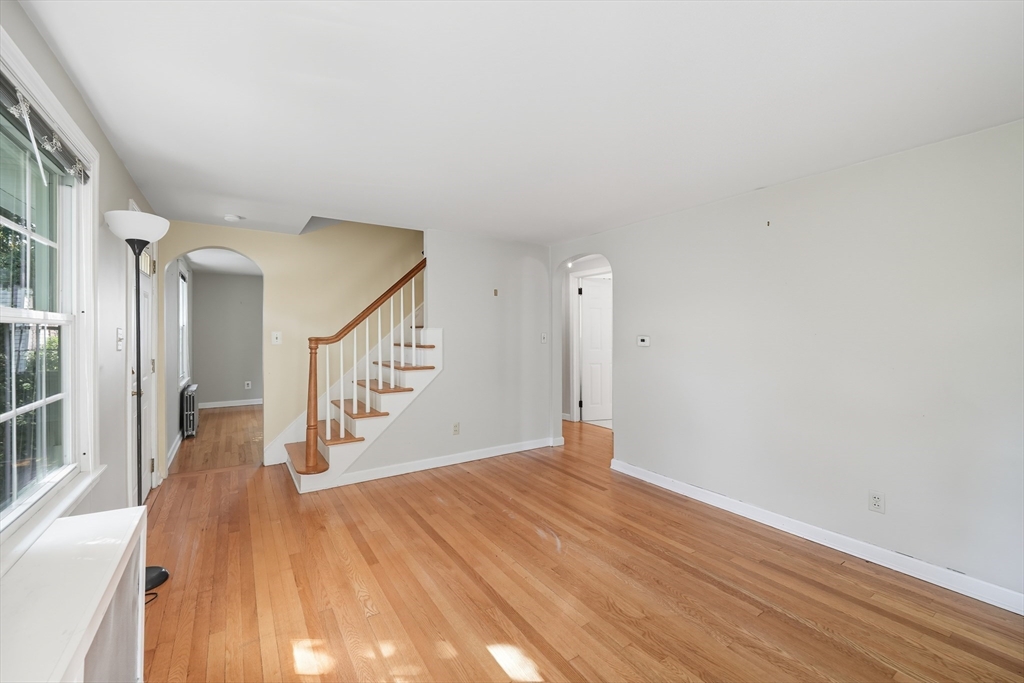 1636 Longmeadow Street Longmeadow, MA 01106 - Photo 8 of 33 a view of a hallway with wooden floor and staircase