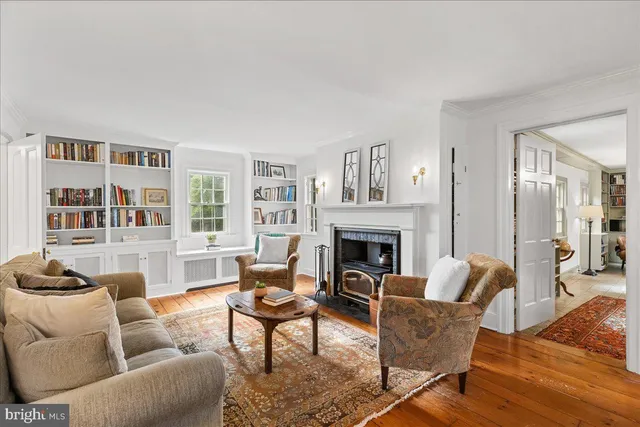 a view of a living room and balcony