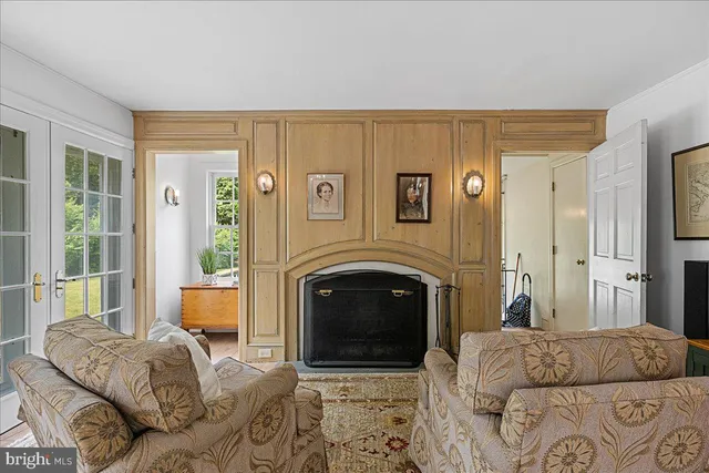 a bathroom with a sink a mirror and a shower