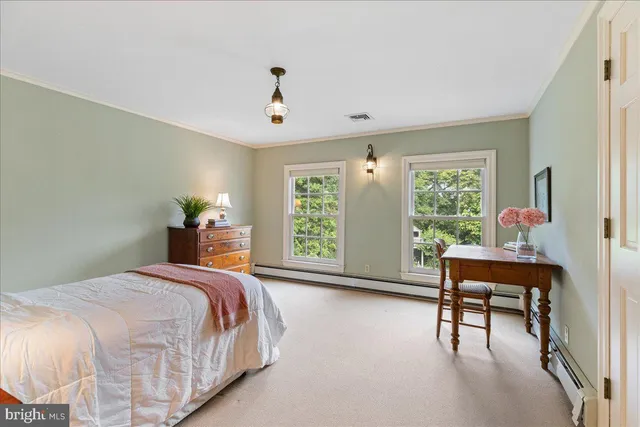 a view of a swimming pool with an outdoor space