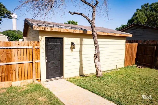 a view of a house with a garage