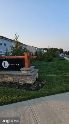 a view of a patio front of house