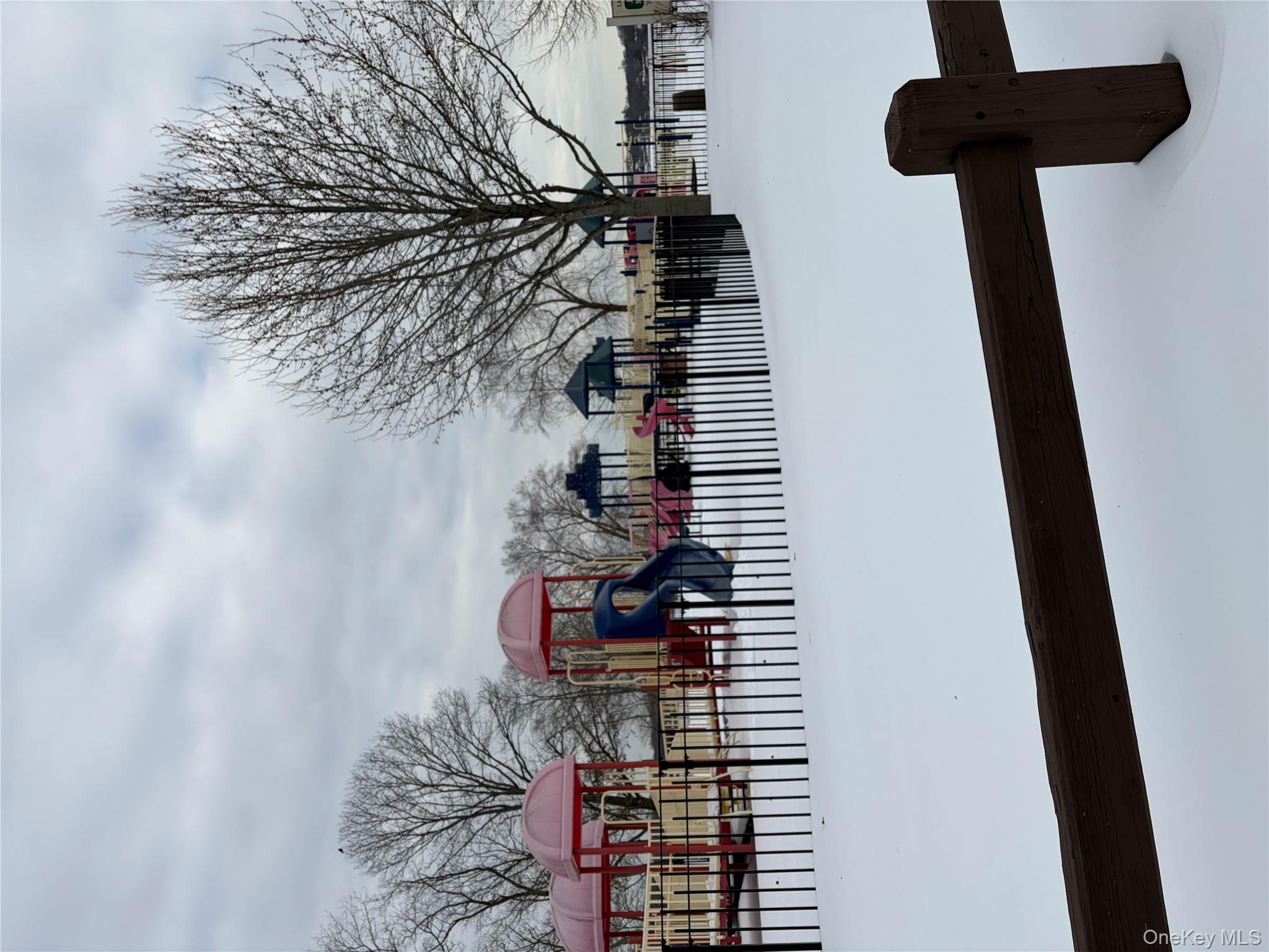 61 Eastview Road Ronkonkoma, NY 11779 - Photo 26 of 27 a view of a house with a yard