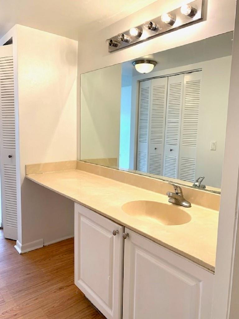 721 North Pine Island Road, Unit 213 Plantation, FL 33324 - Photo 15 of 34 a bathroom with a sink and a mirror