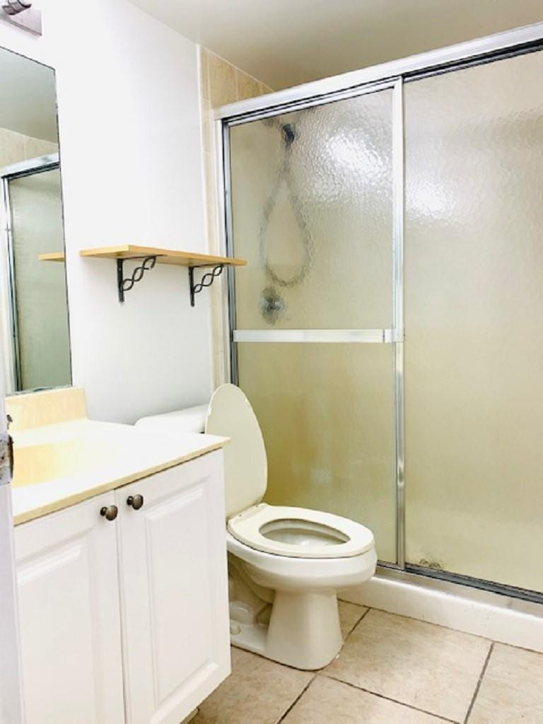 721 North Pine Island Road, Unit 213 Plantation, FL 33324 - Photo 22 of 34 a bathroom with a toilet and a shower
