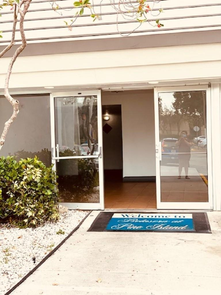 721 North Pine Island Road, Unit 213 Plantation, FL 33324 - Photo 24 of 34 a view of a door front of a house