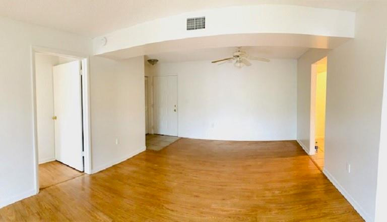 721 North Pine Island Road, Unit 213 Plantation, FL 33324 - Photo 6 of 34 a view of a big room with closet and a chandelier fan