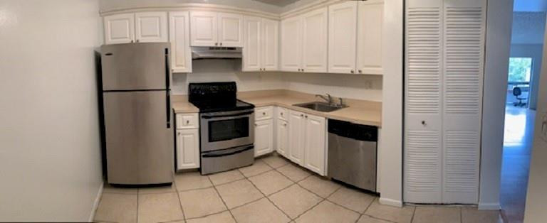721 North Pine Island Road, Unit 213 Plantation, FL 33324 - Photo 7 of 34 a kitchen with a refrigerator sink and stove