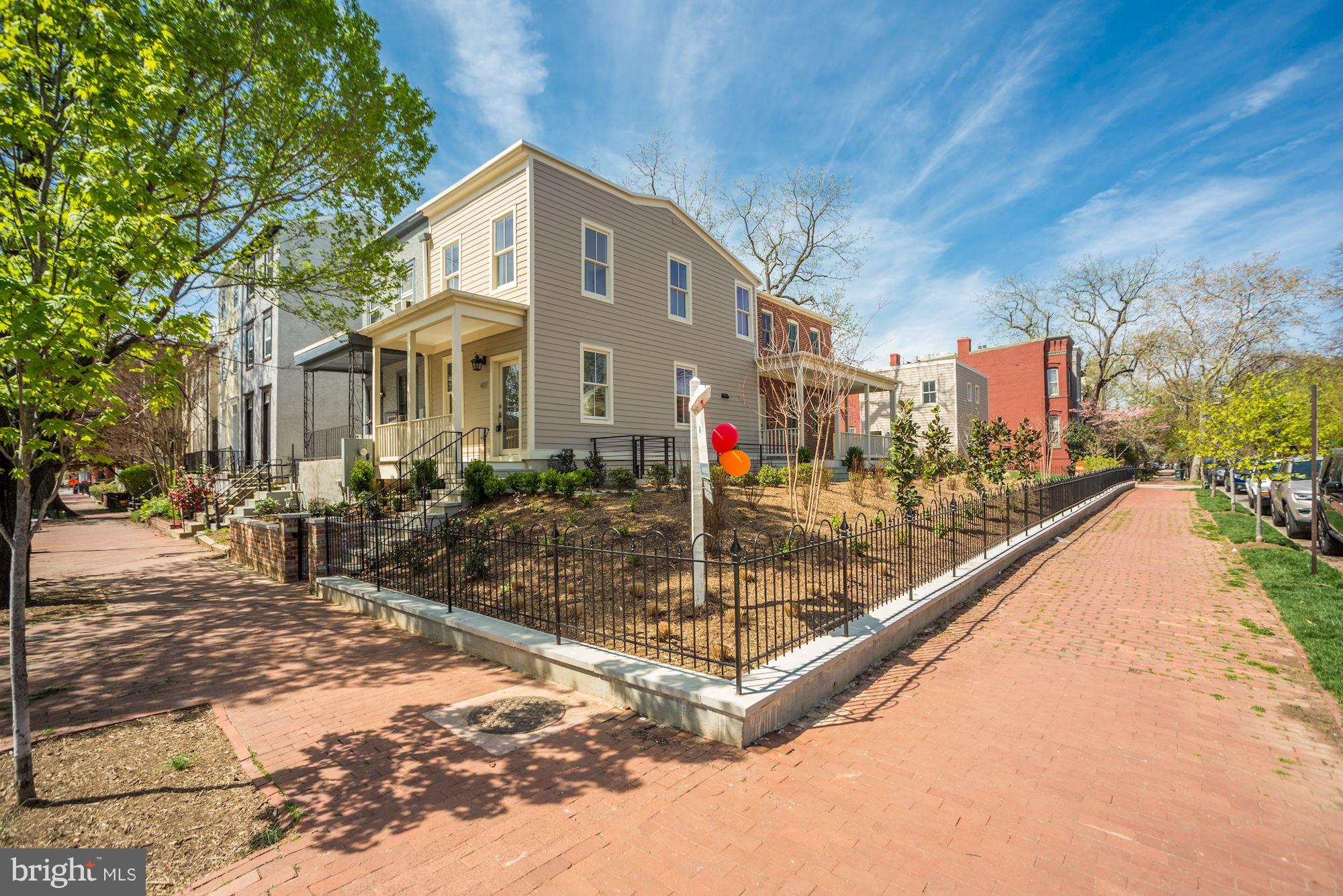 401 11th Street Southeast Washington, DC 20003 - Photo 1 of 27 a view of a house with a yard