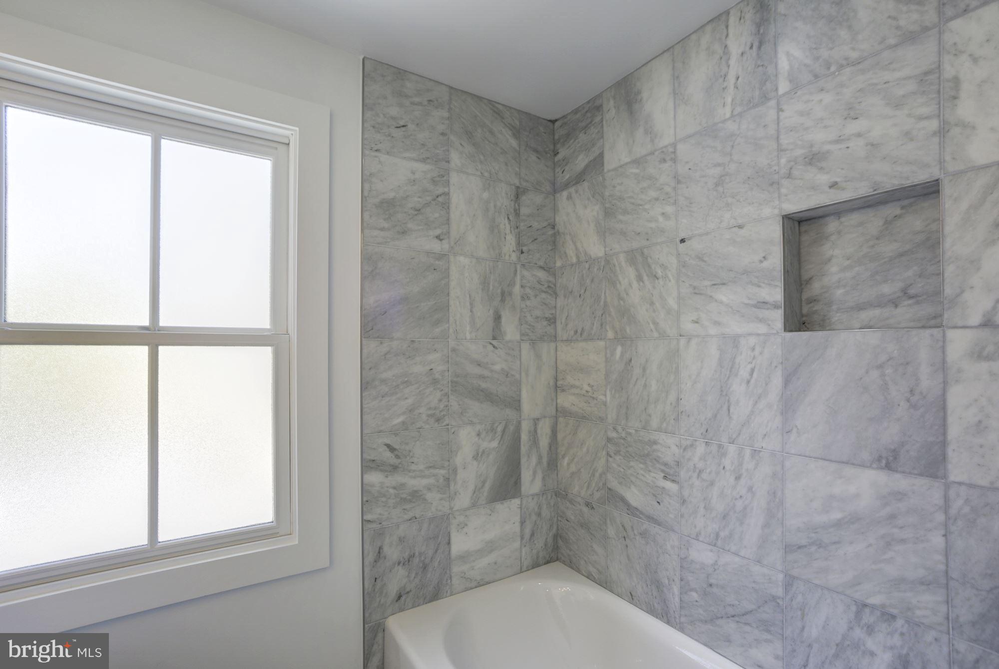401 11th Street Southeast Washington, DC 20003 - Photo 18 of 27 a bathroom with a toilet and a shower