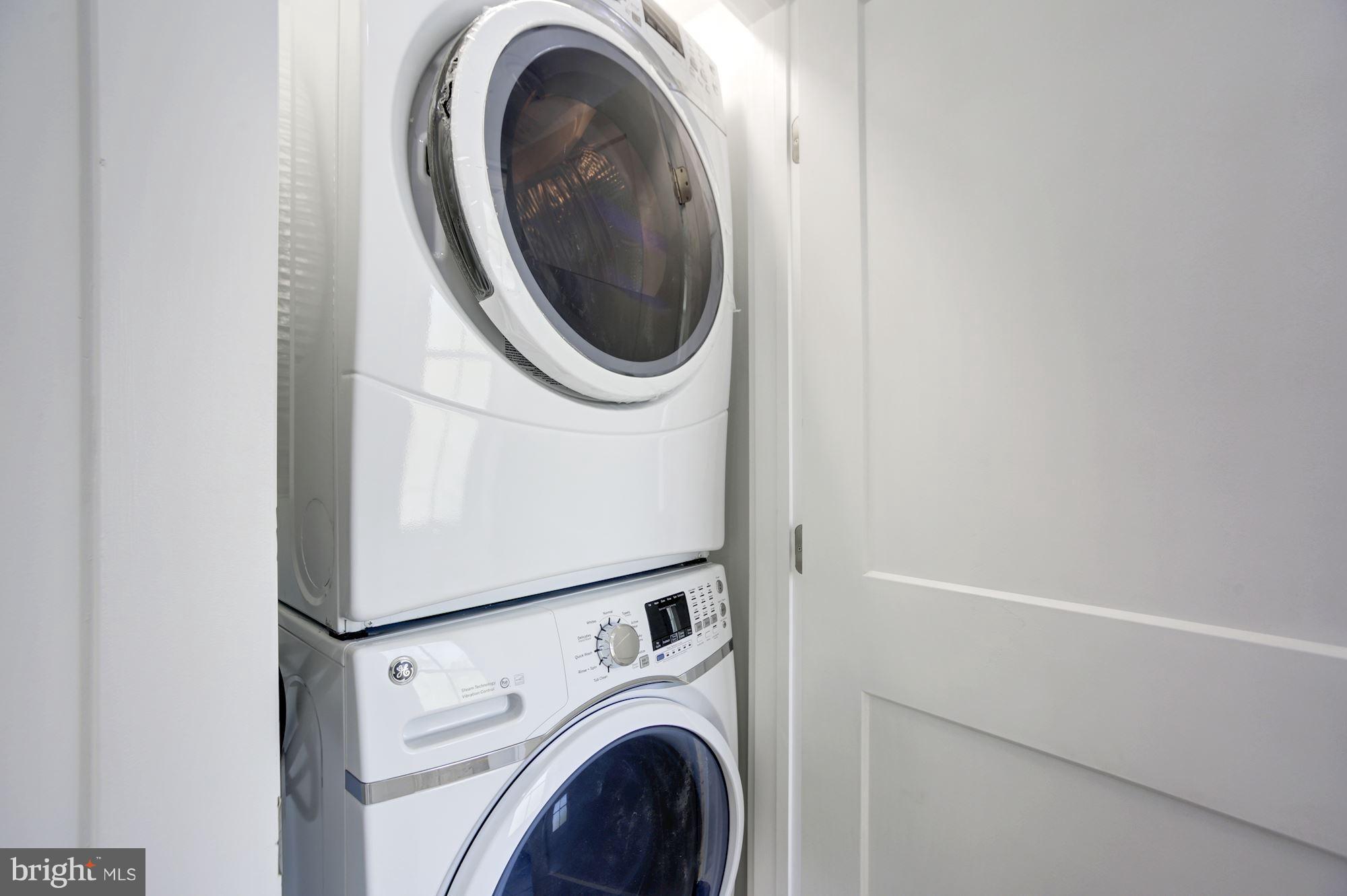 401 11th Street Southeast Washington, DC 20003 - Photo 26 of 27 a utility room with dryer and washer