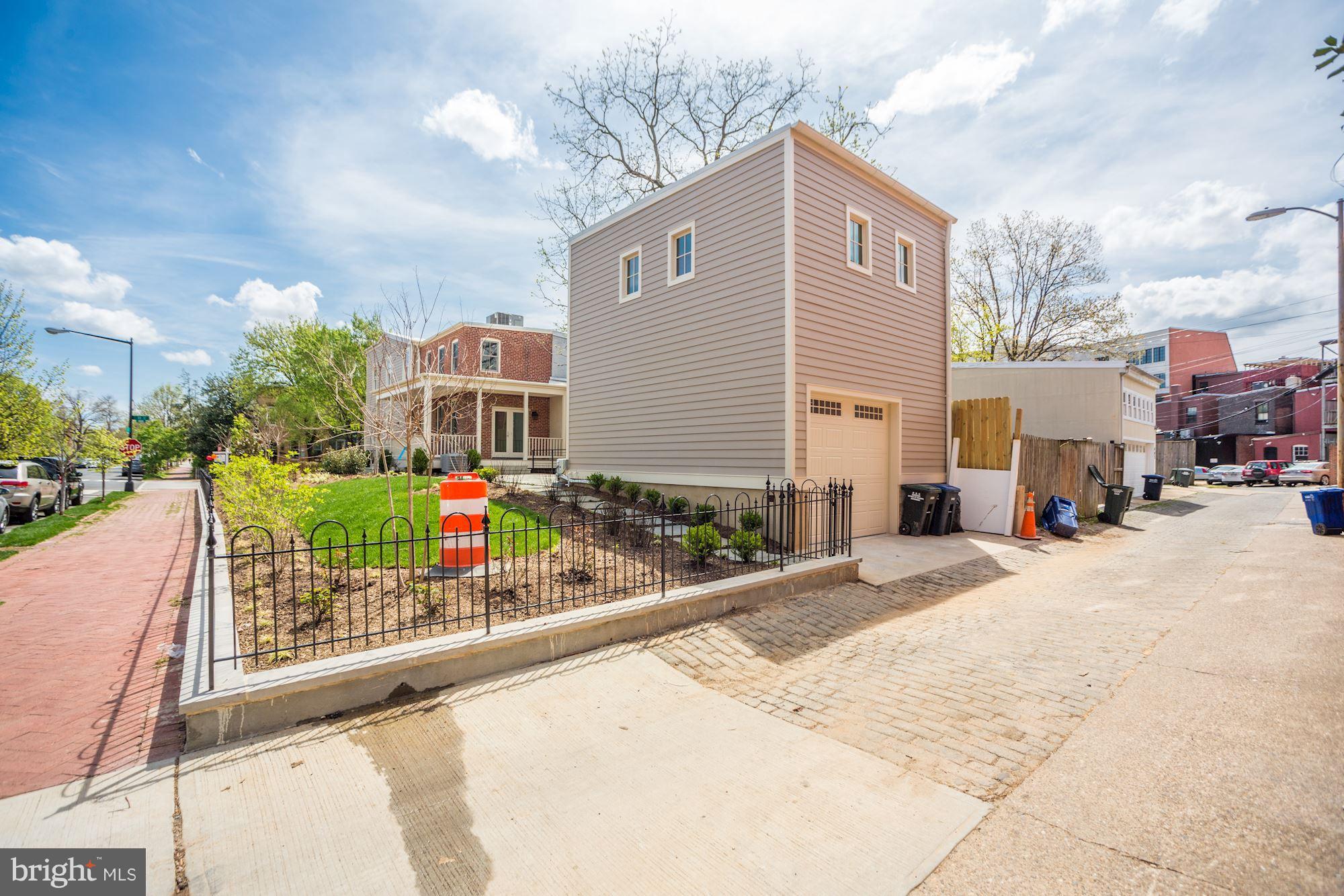 401 11th Street Southeast Washington, DC 20003 - Photo 5 of 27 a front view of a house with basket ball court