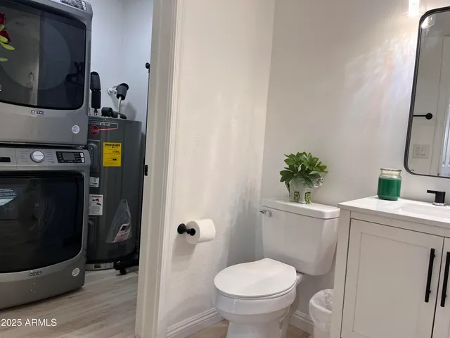 a bathroom with a toilet and a sink