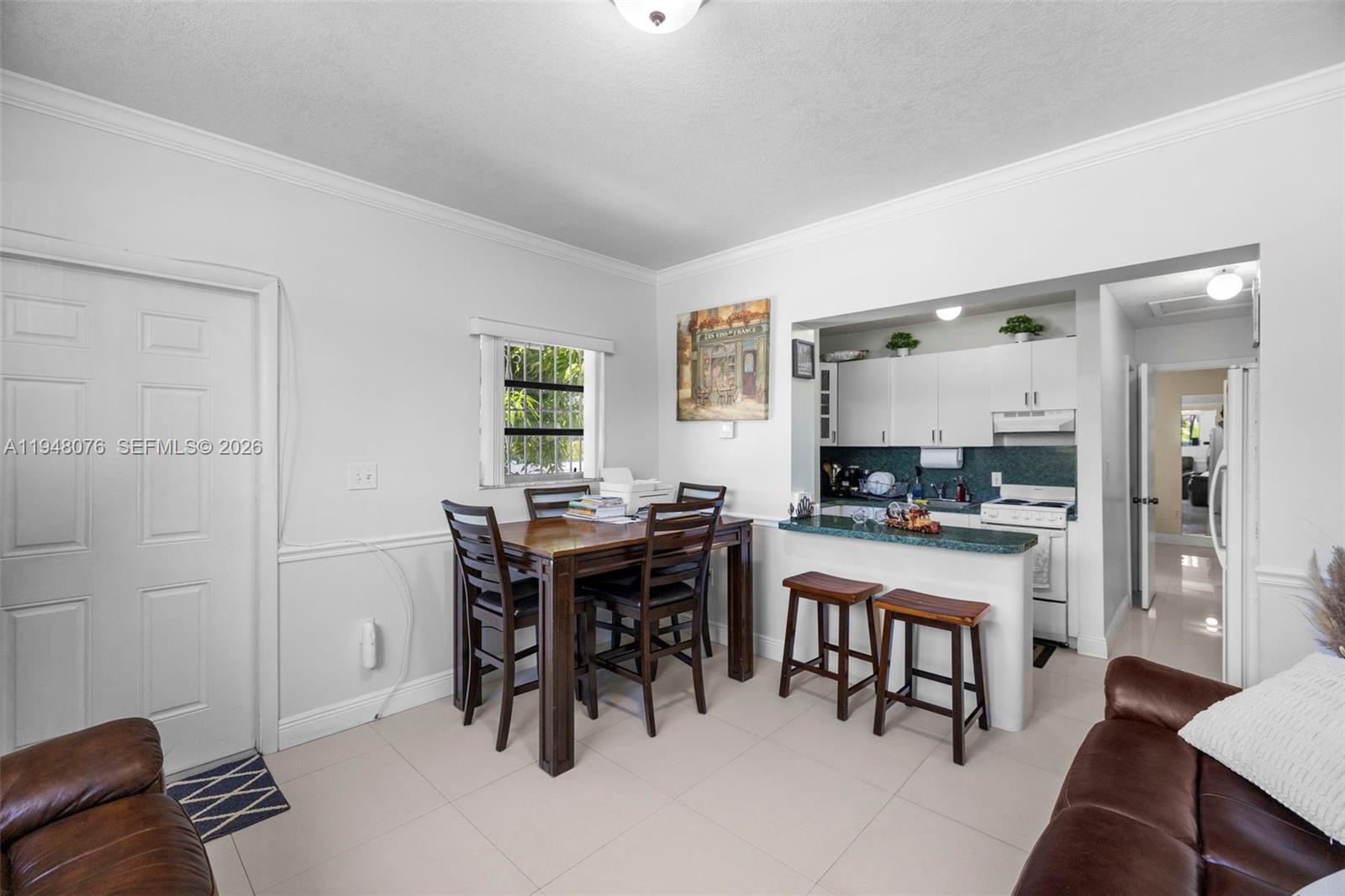 8631 Southwest 16th Terrace Miami, FL 33155 - Photo 35 of 39 a view of a dining room with furniture