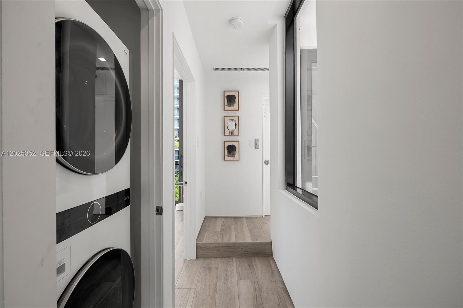 1525 Bay Road Miami Beach, FL 33139 - Photo 26 of 45 Hallway with Laundry